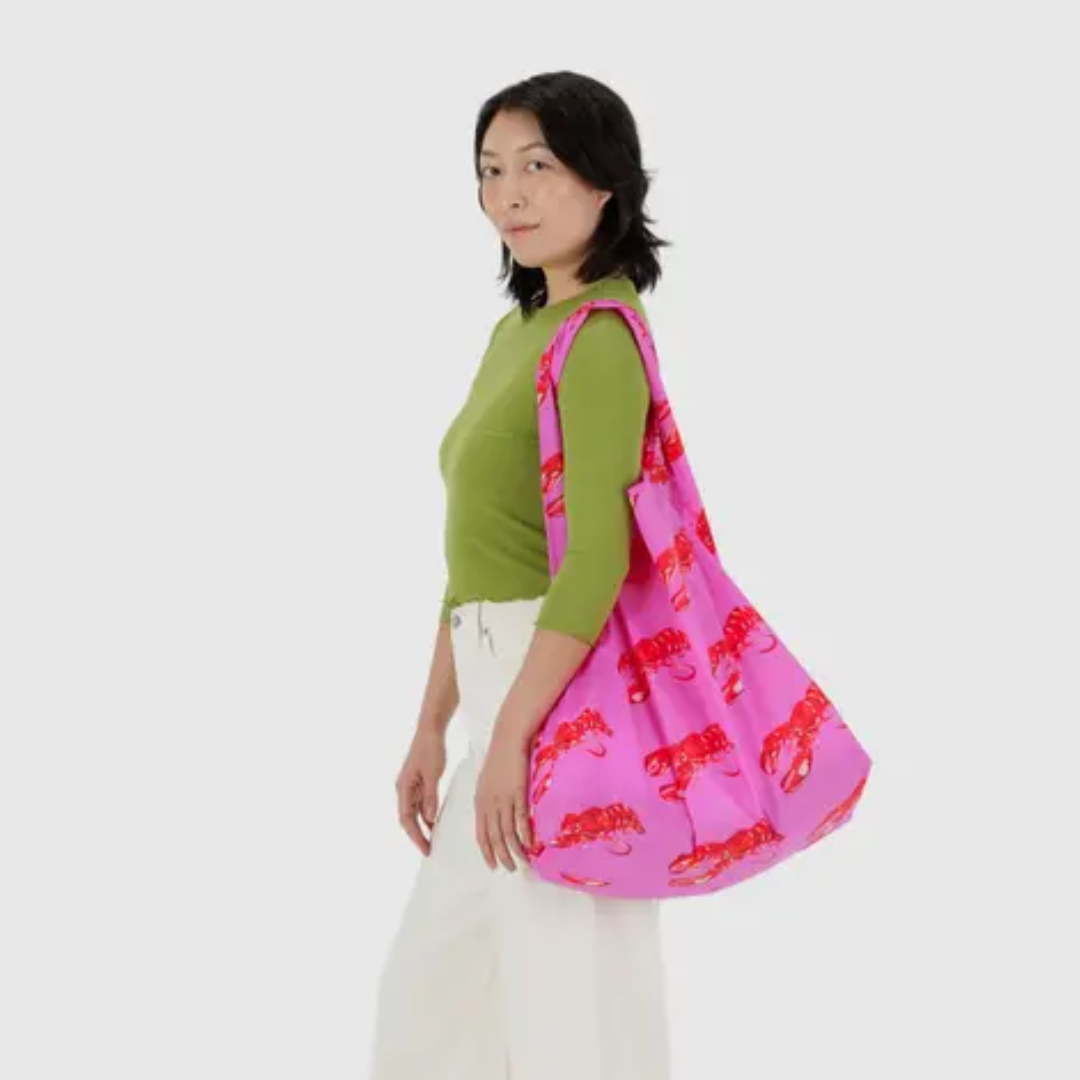 Model holding the shopping bag