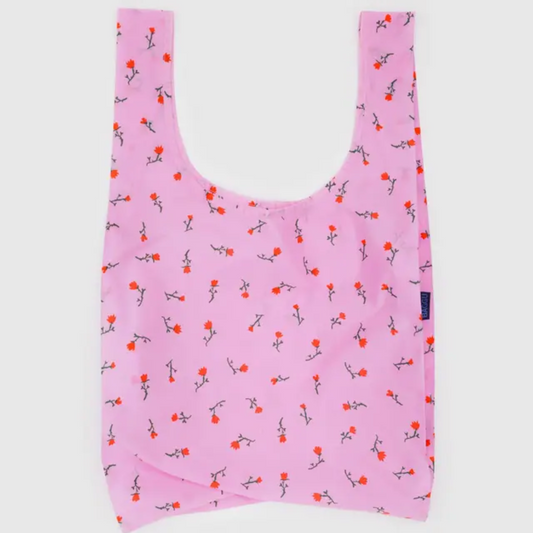 Pink reusable bag with floral pattern