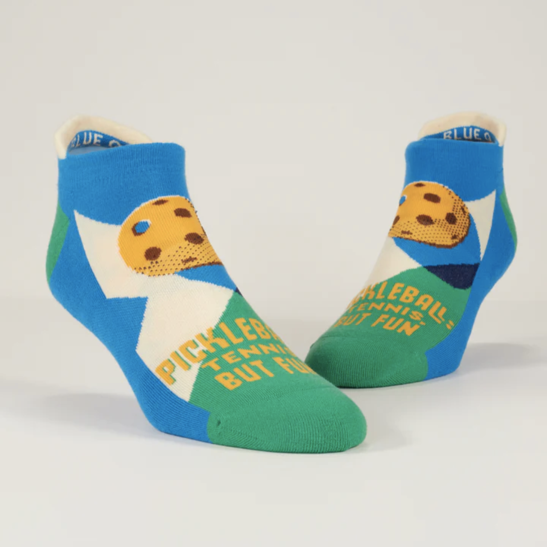 Socks on display feet show that they hit at the ankle and have the graphic design on the front of the sock
