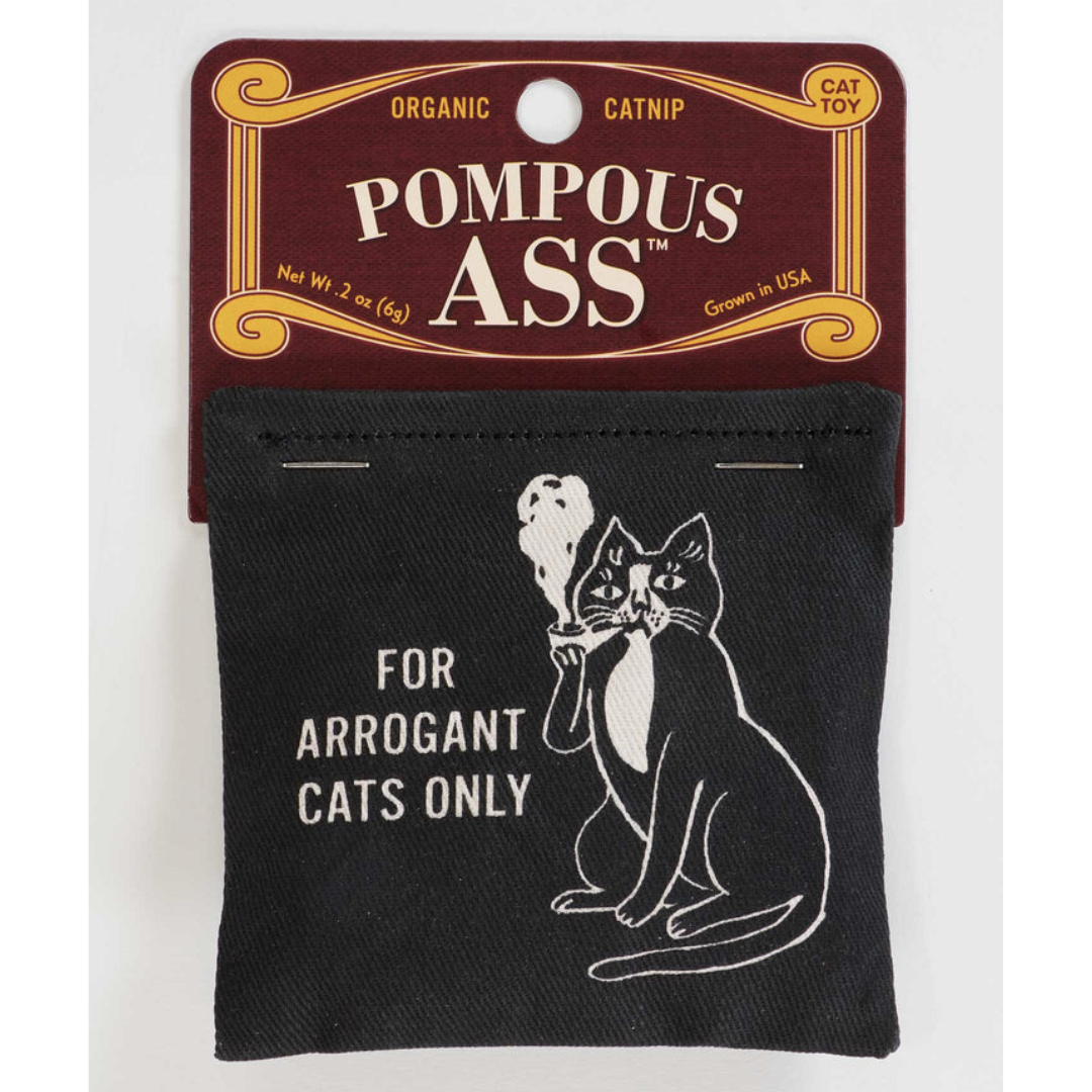Pompous Ass organic catnip toy is black and white with a tuxedo cat smoking a pipe