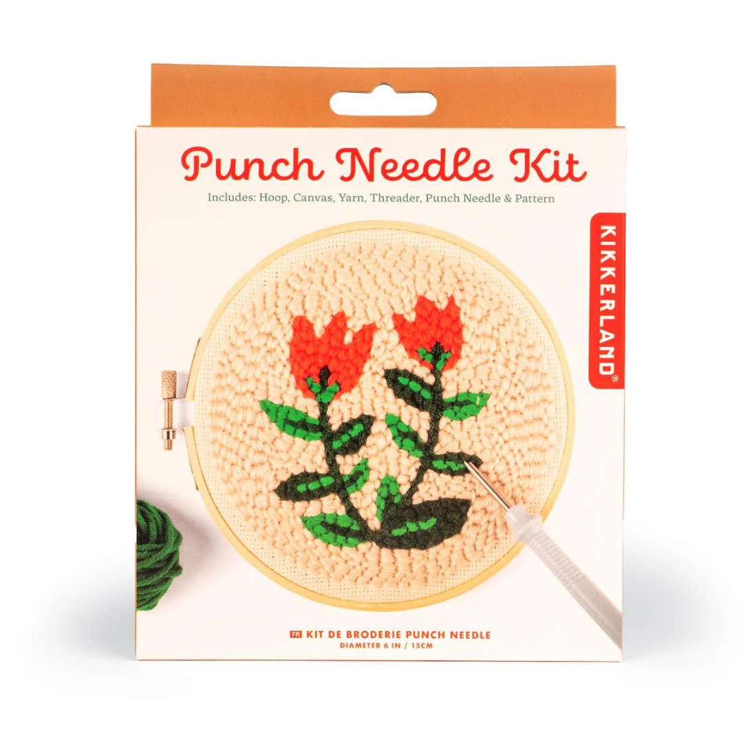 Orange and white boxed packaging for tulip punch needle kit featuring the words "punch needle kit" in red writing.