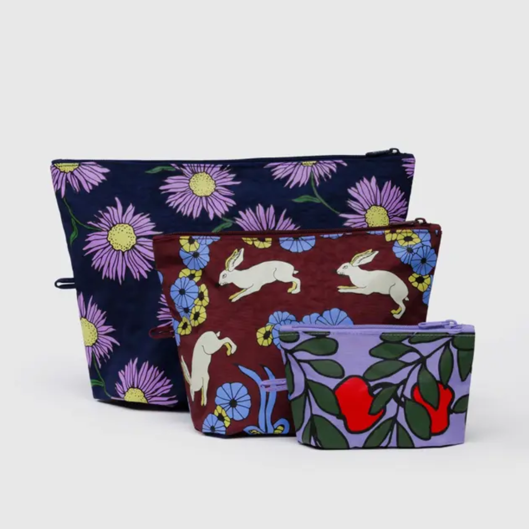 Three patterned pouches in a flora and fauna theme- Small, medium. and large with gusseted bottoms to stand up when full