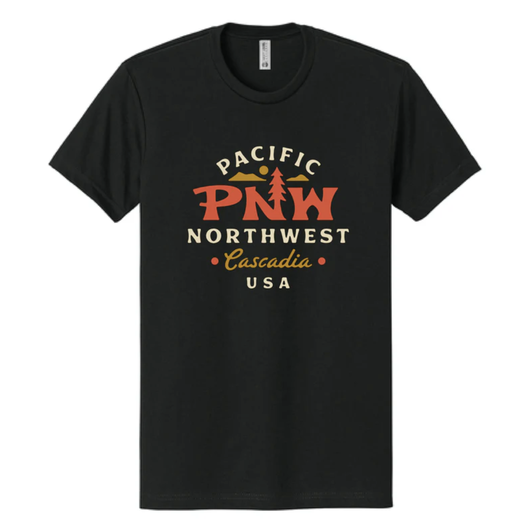 Black t-shirt with 'Pacific Northwest PNW Cascadia USA' text design. The back leg of the N is an evergreen tree