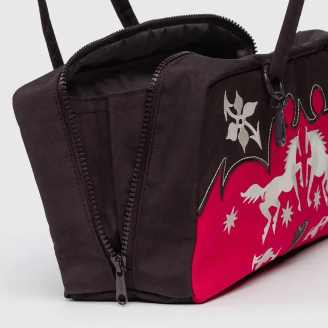 Baggu bowler bag is open to show interior gusset