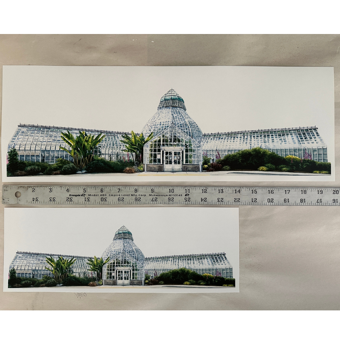 The large and the medium print shown with a ruler for scale