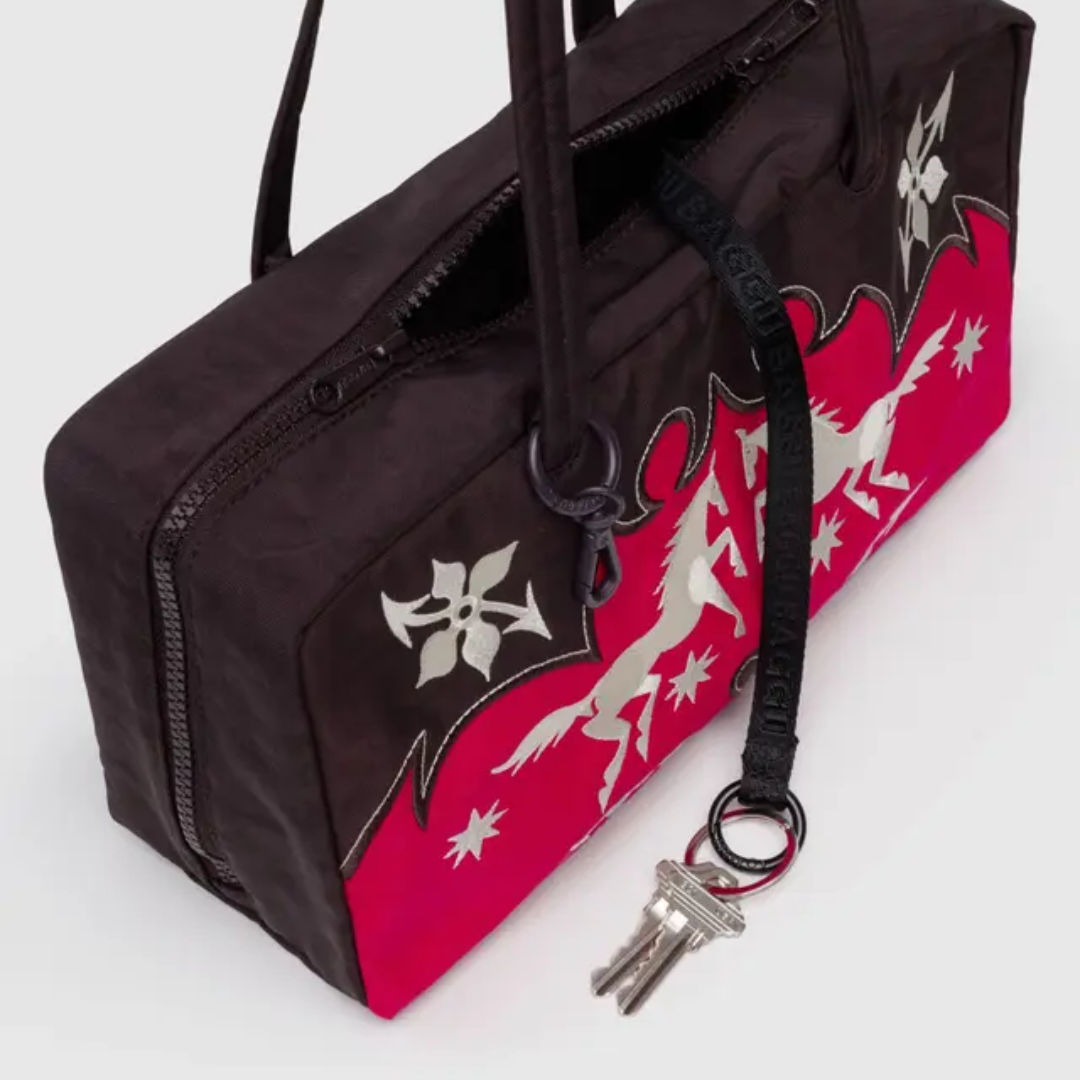Detail of the internal key strap in the bowler bag