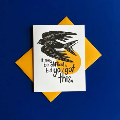 blue background with yellow envelope underneath white card, print of black bird and text reading 
