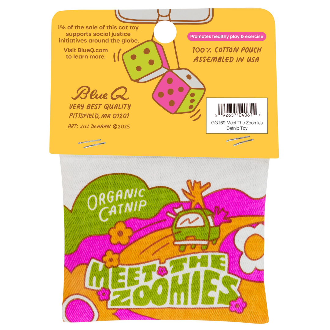 Back of the packaging features a pair of dice hanging from a rearview mirror. Back of the toy shows the cats have truly lost their minds with one of the cats ON TOP of the van and the other two hanging out the windows. Clearly unsafe road behavior, but when you're on the nip safety comes last. They drive on an orange road through pink and green hills leaving orange, pink, and white daisies in their wake. The bottom of the toy says "Meet the Zoomies" and the hills say "Organic Catnip"