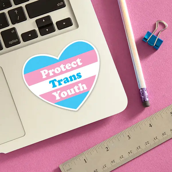 pink blue and white striped protect trans youth heart shaped sticker on laptop