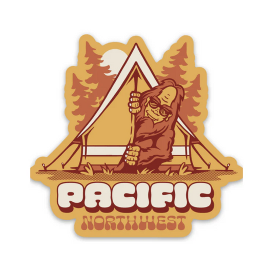 Sticker with Sasquatch in a tent and 'Pacific Northwest' text in shades of yellow and orange