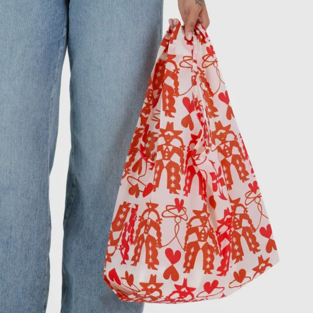 Model holding the shopping bag