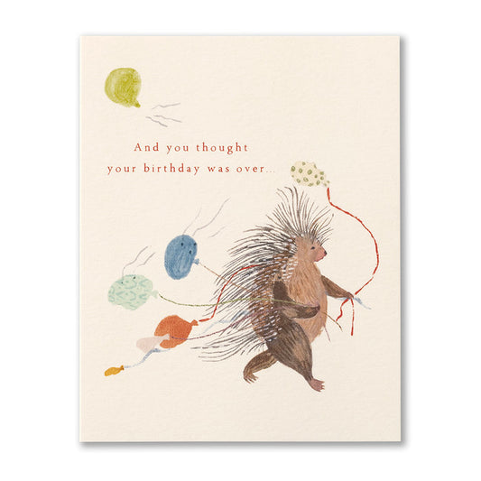 Belated Birthday Card with a porcupine carrying deflated balloons. "And you thought your birthday was over..."