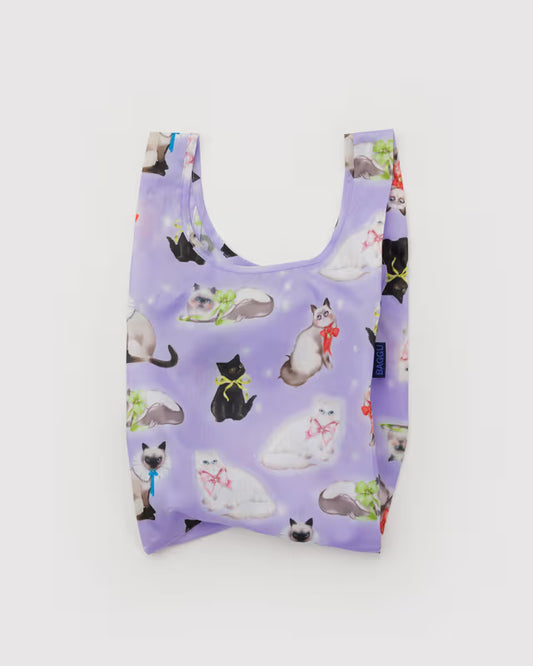 Reusable shopping bag with cat pattern on a light purple background