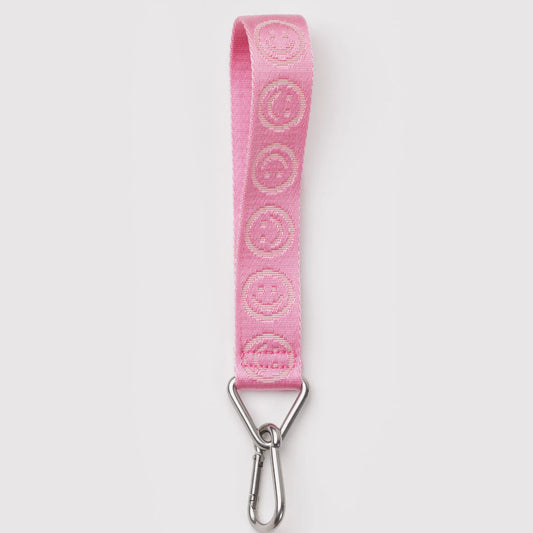 Pink keychain with embroidered design and metal clip