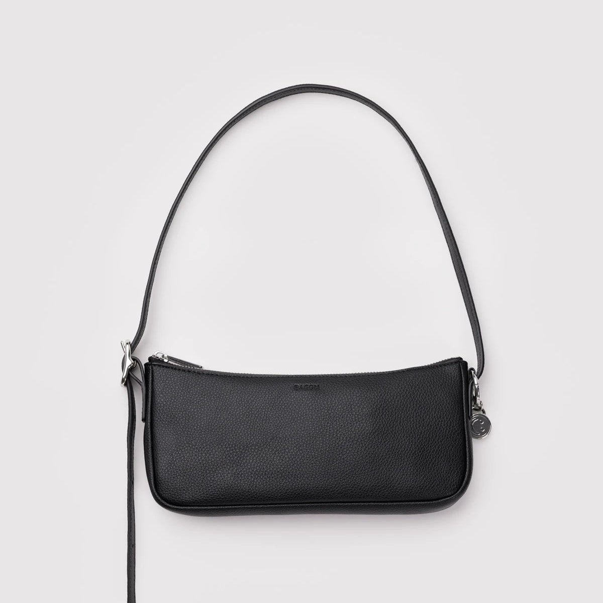 Black shoulder bag on a light gray background