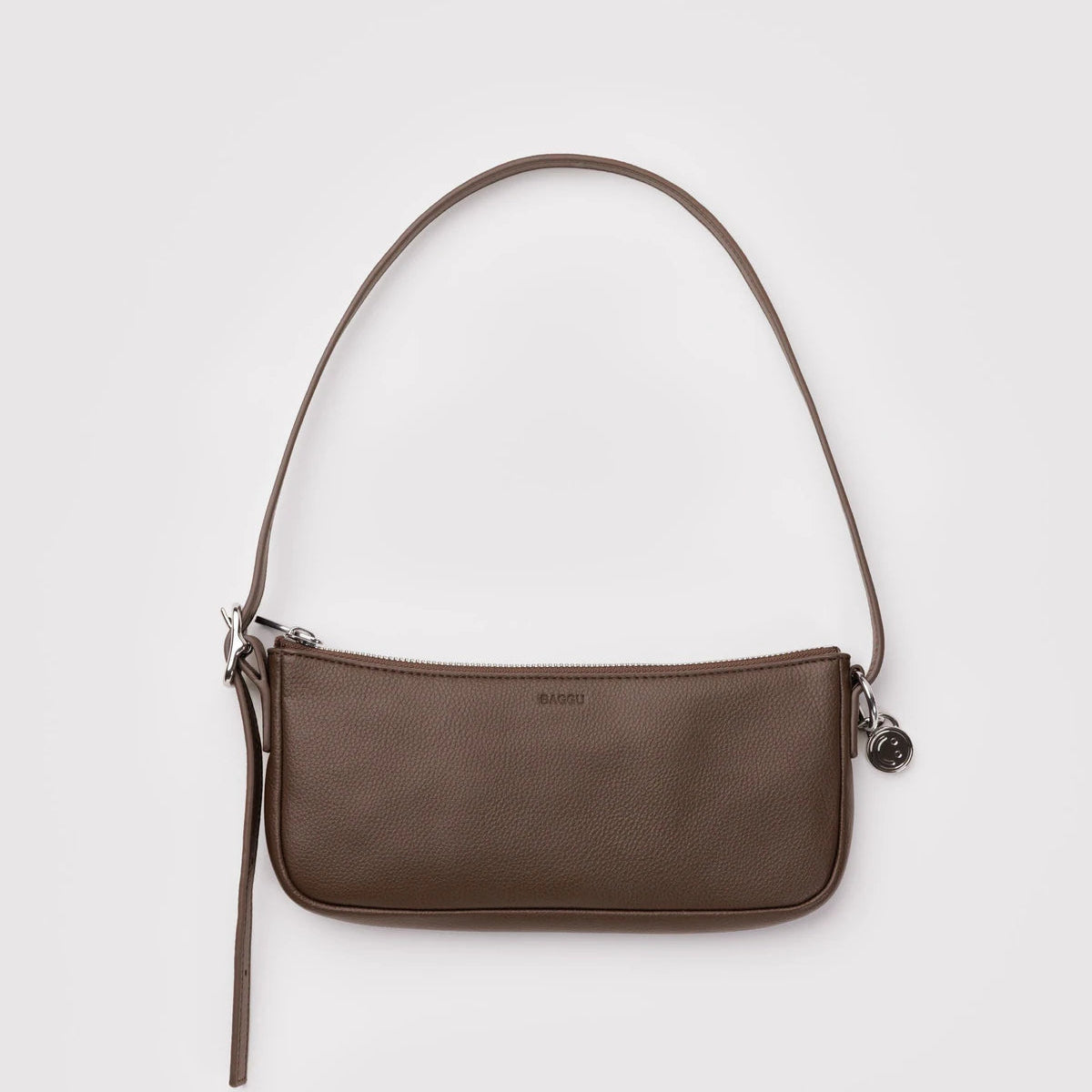 Brown shoulder bag on a light gray background
