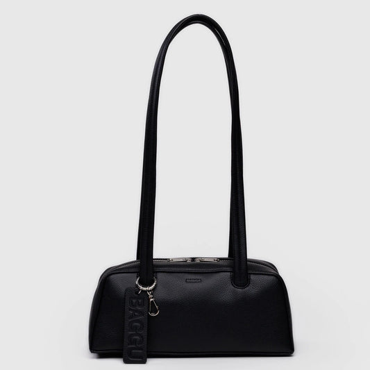 Black handbag with a strap on a light gray background