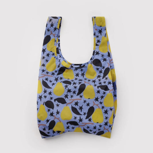 A reusable plastic bag with a blue background and a pattern of yellow pears and black stars, shown against a plain white background.