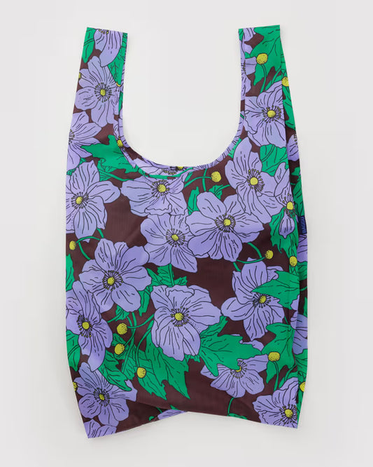 Reusable bag with purple floral pattern on a maroon poppy.