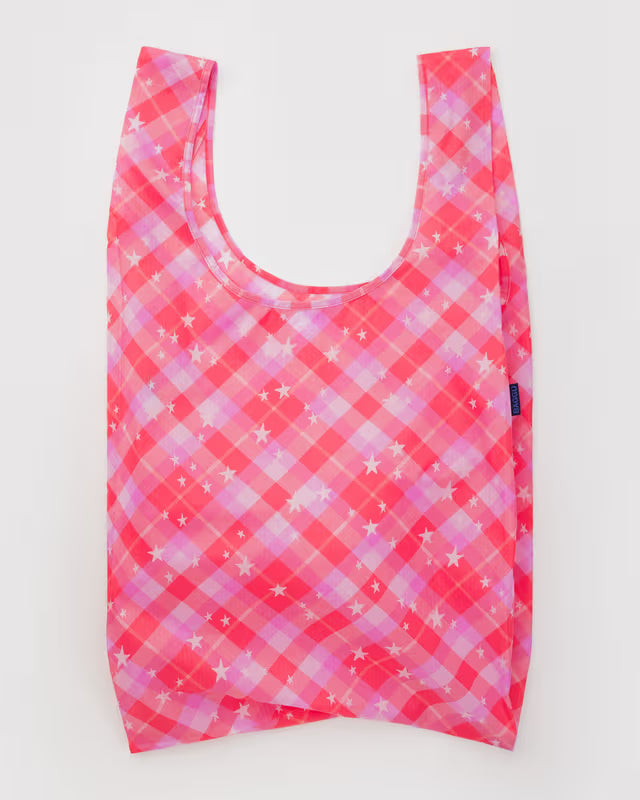 Reusable shopping bag with pink and purple plaid pattern on a white background