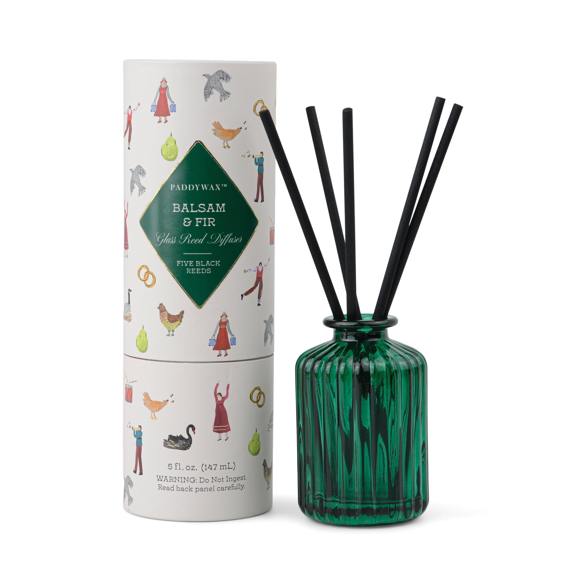 Paddywax Balsam & Fir diffuser in a green fluted glass with packaging decorated in the 12 days of Christmas.