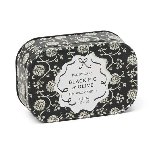 Candle tin with a black and gray floral design says "Paddywax Black Fig & Olive soy wax candle"