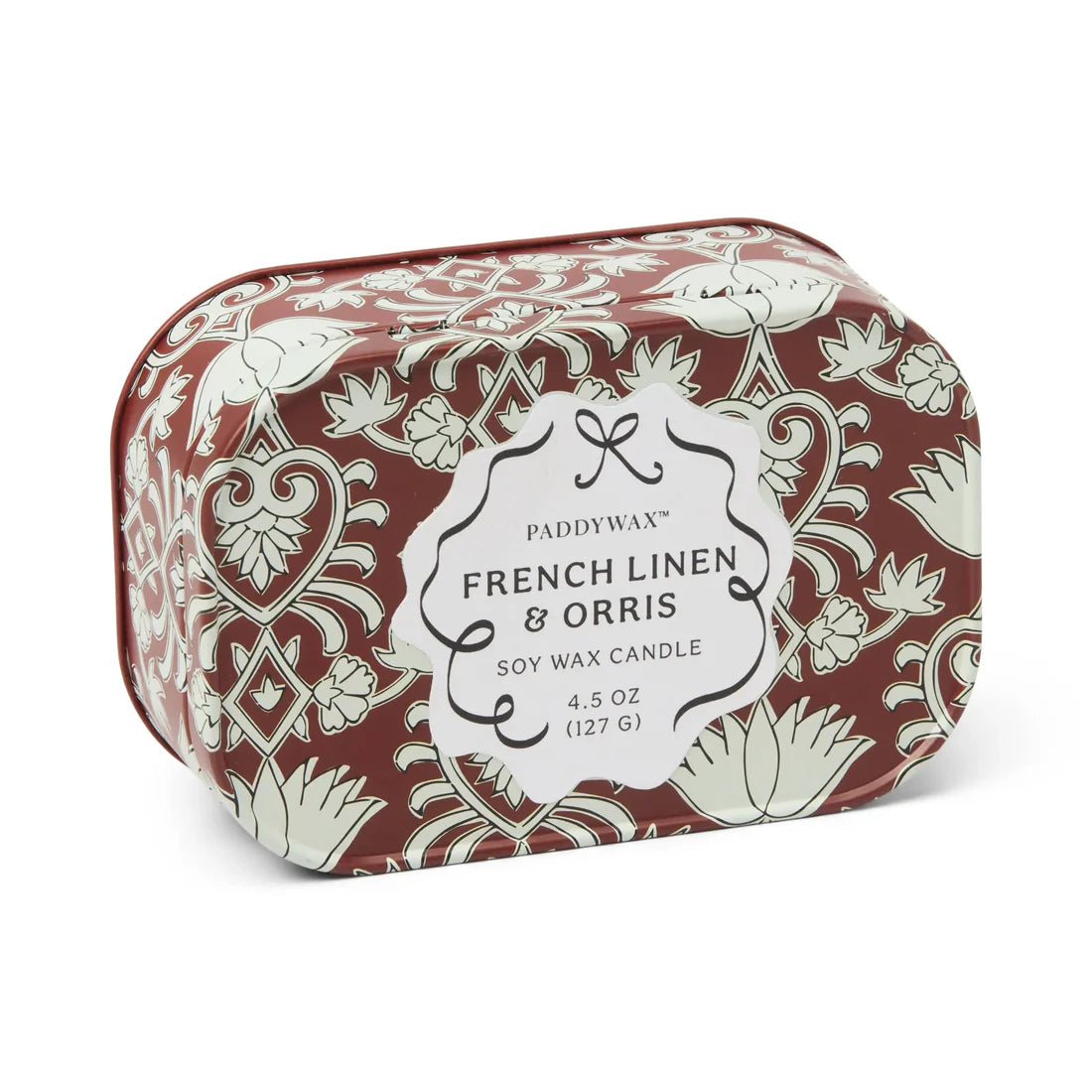 Candle tin with decorative pattern  label reads " Paddy wax French Linen & Orris Soy Wax Candle"