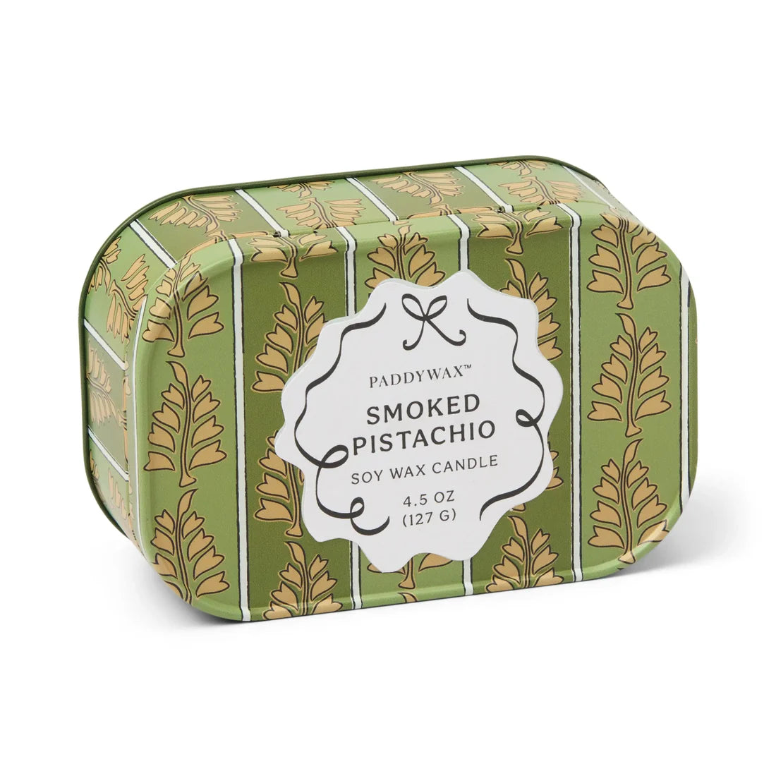 Paddywax Smoked Pistachio candle in a decorative tin with green and gold design.