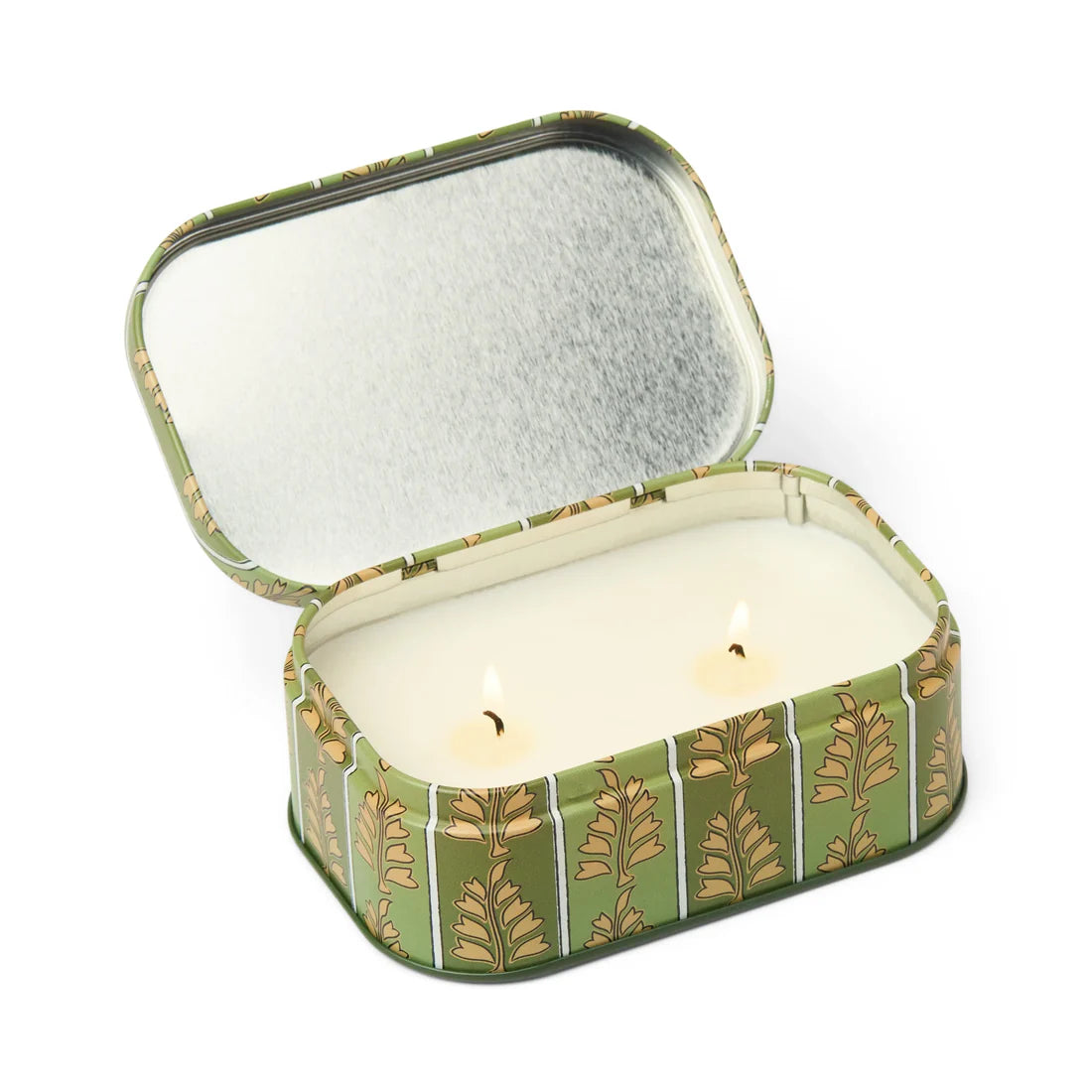 Candle in a decorative tin with a leaf pattern 