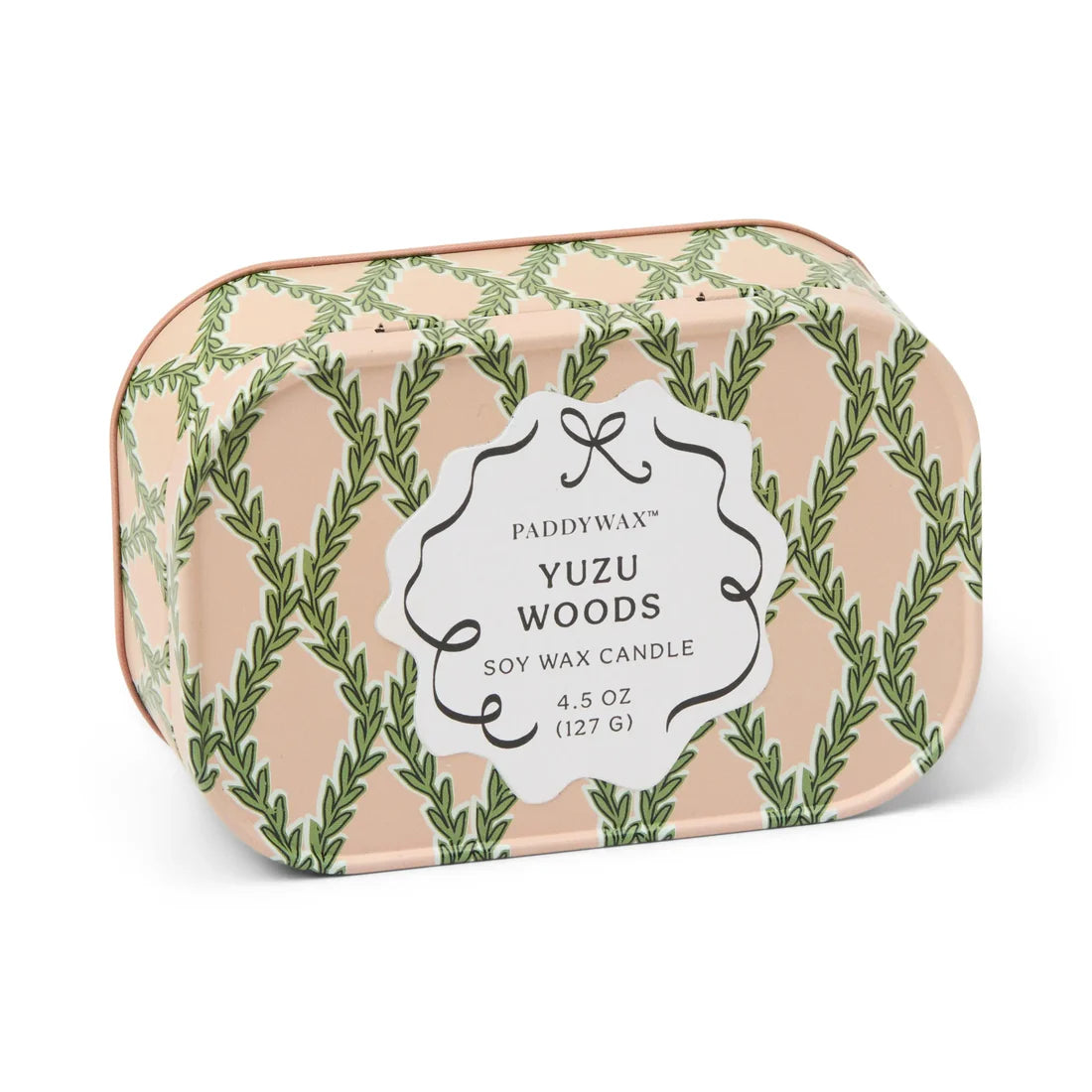 Paddywax Yuzu Woods candle in a decorative tin with green leaf pattern 