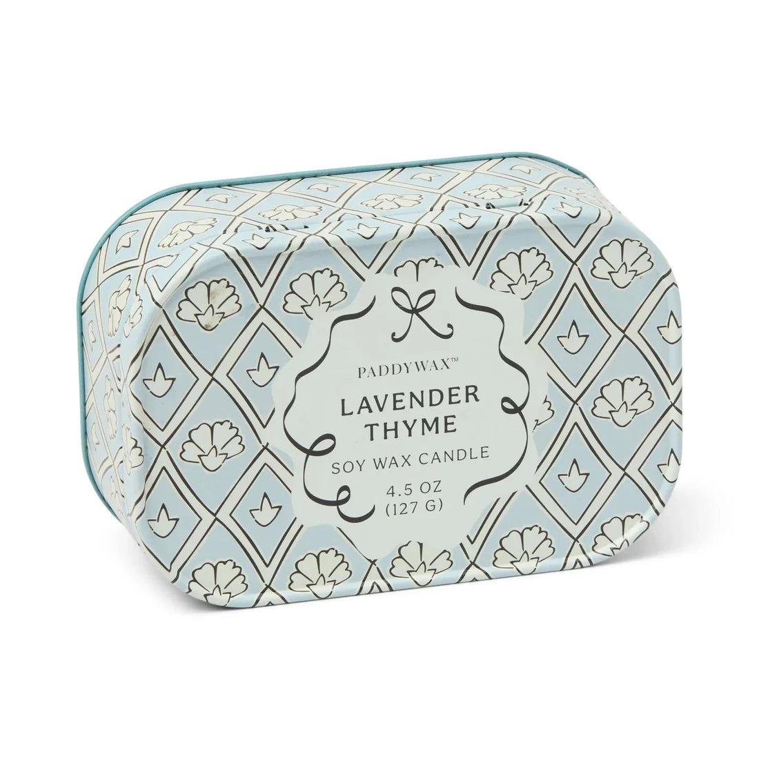 Paddywax Lavender Thyme candle in a decorative  blue and white tin 