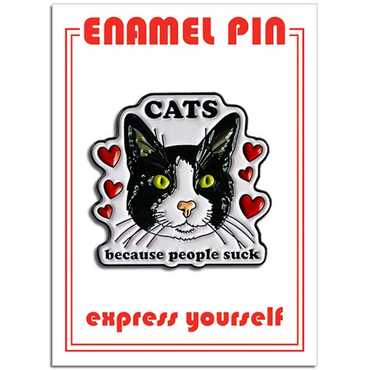 Enamel pin with a cat design and text THat says "CATS because people suck" on a white background