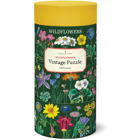 Cylindrical puzzle box with floral design and 'Wildflowers' text on a white background
