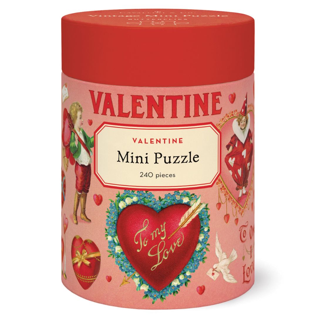 Valentine-themed mini puzzle packaging with red lid and pink base.