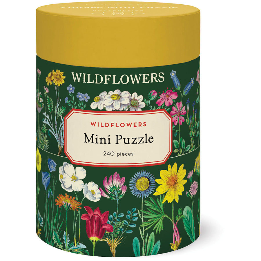 Cylindrical puzzle box with floral design and 'Wildflowers' branding