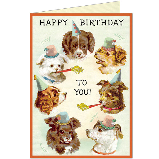 Birthday card with illustrations of dogs wearing party hats and the text 'Happy Birthday to you!'.