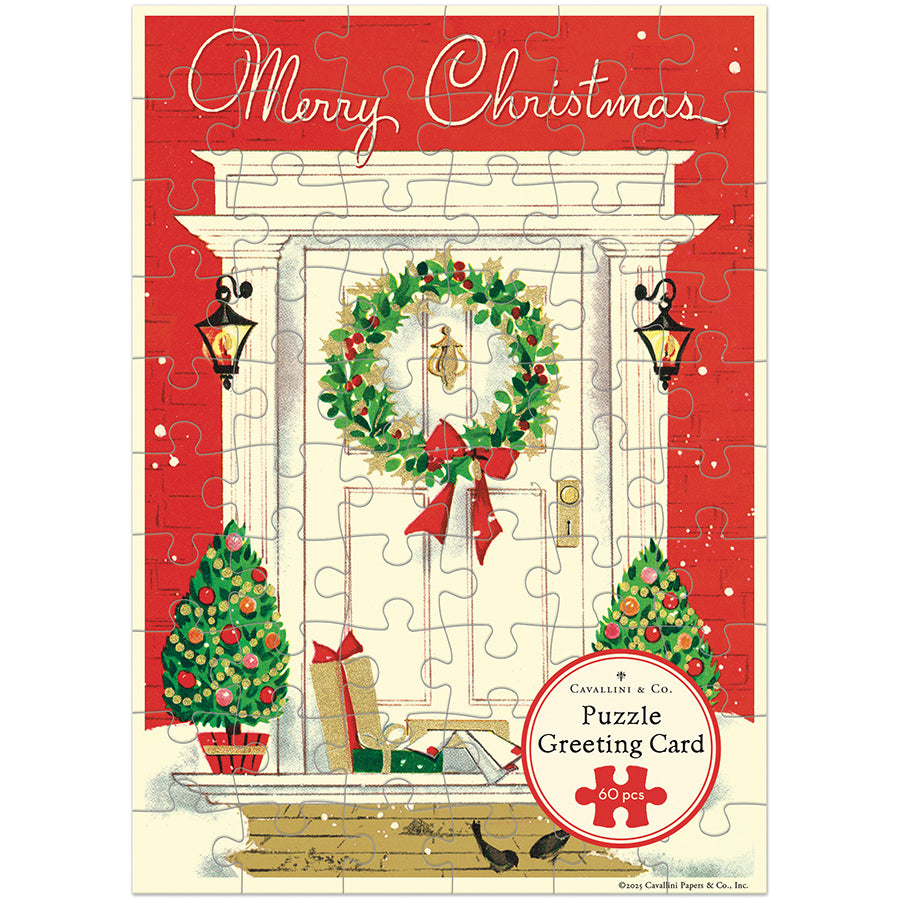Christmas-themed puzzle greeting card with a wreath, trees, and presents on a red background.