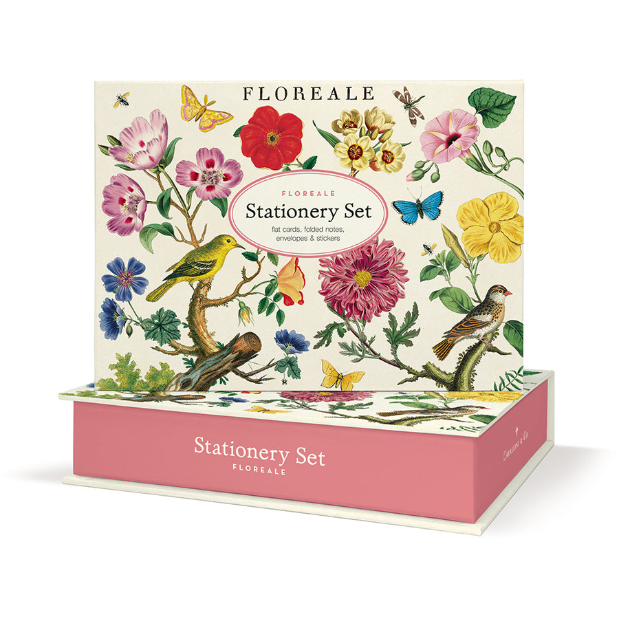 Floreale stationery set packaging with floral and bird design on a white background