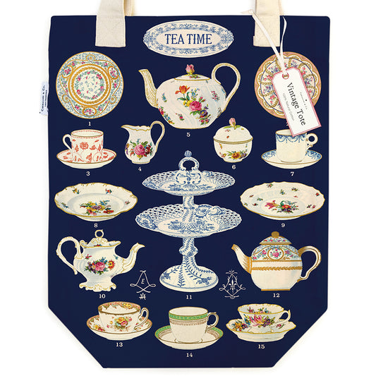 Navy tote bag with vintage tea time design featuring teapots, cups, and plates on a white background.