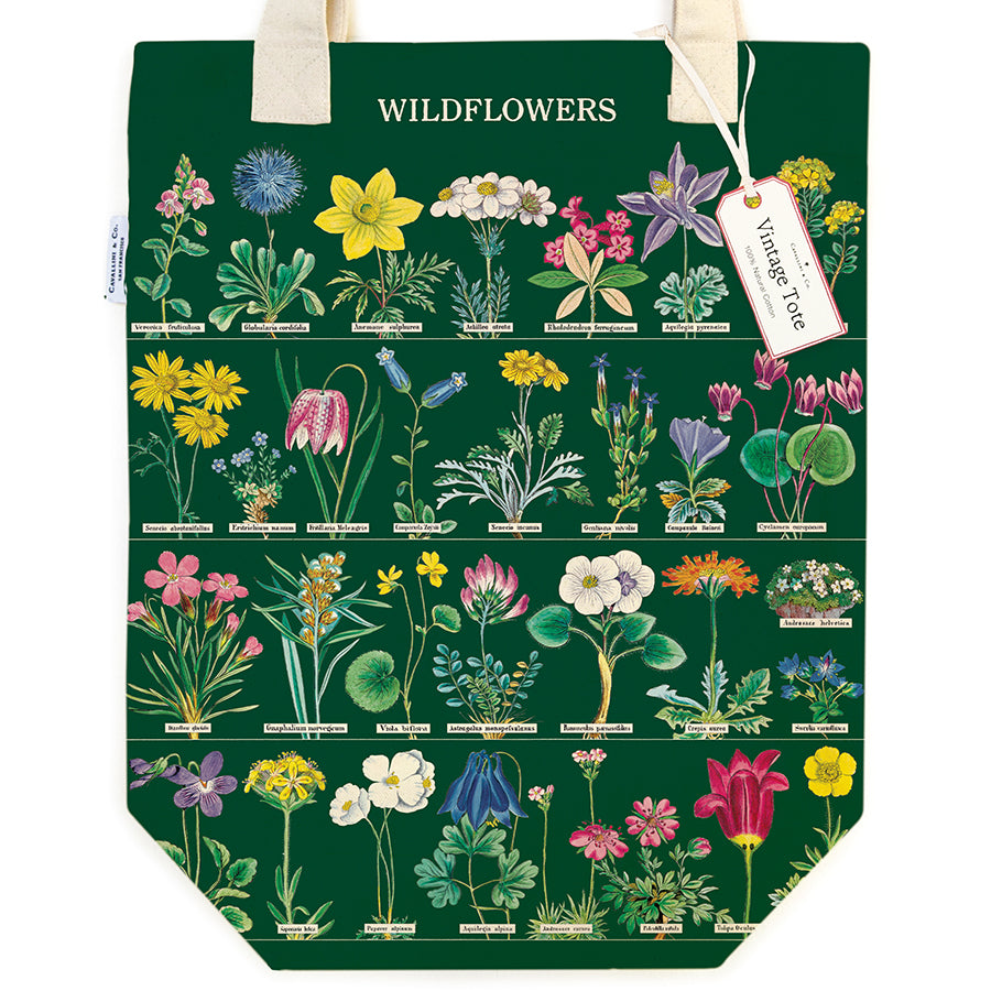 Tote bag with wildflower illustrations on a green background