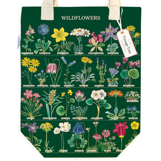 Tote bag with wildflower illustrations on a green background
