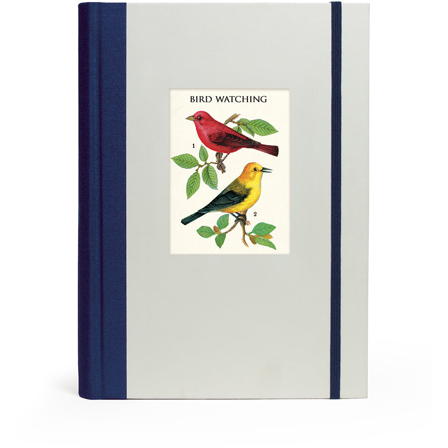 Notebook with bird illustration on the cover against a white background