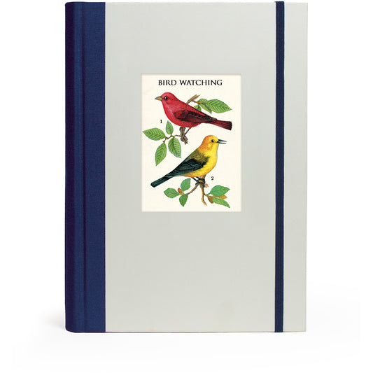 Notebook with bird illustration on the cover against a white background