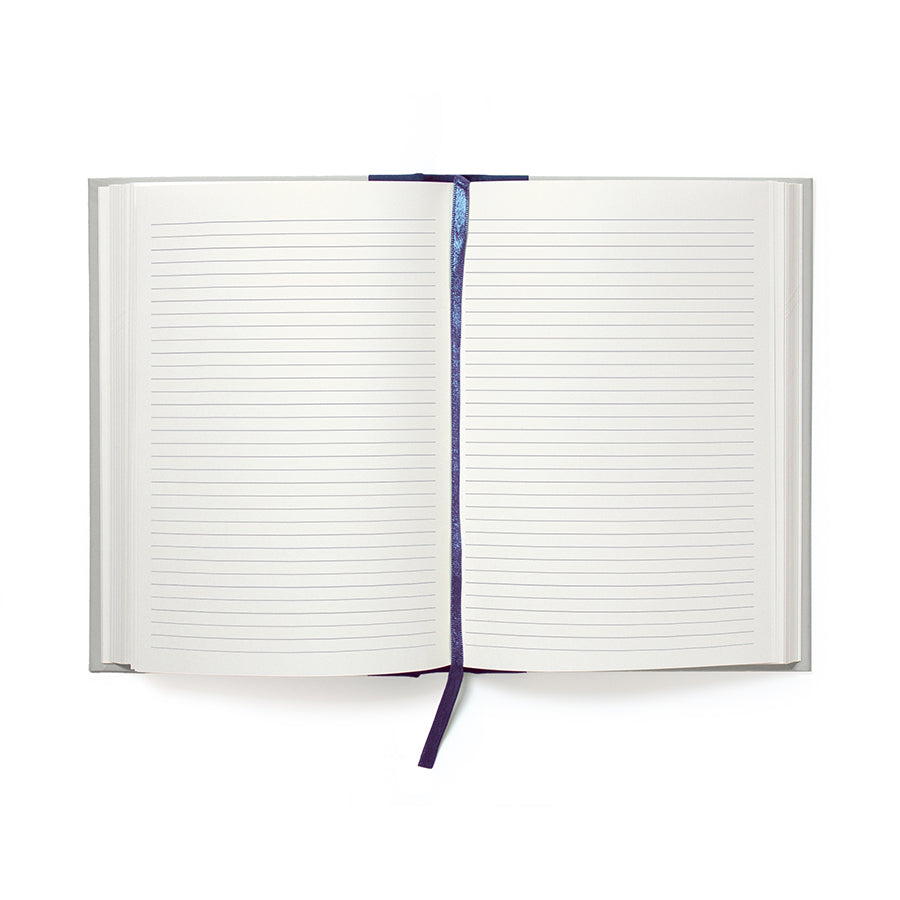 Open notebook with lined pages on a white background