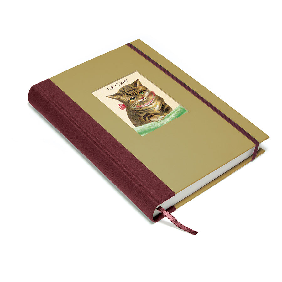 Journal with a cat illustration on the cover against a white background