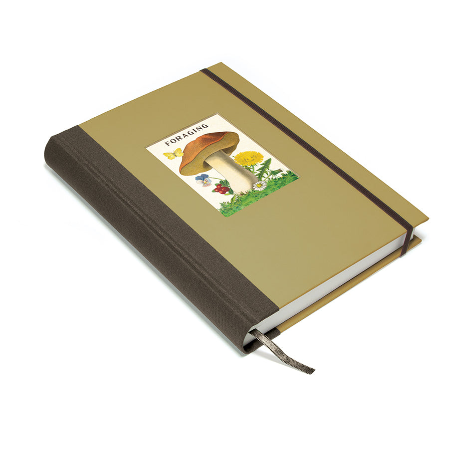Notebook with mushroom illustration on a beige cover