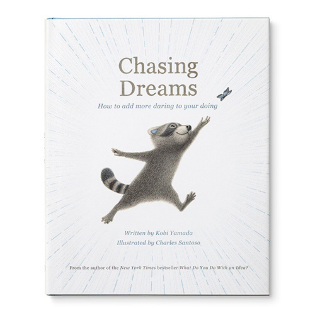 Cover for "Chasing Dreams; How to add more daring to your doing" Written by Kobi Yamada Illustrated by Charles Santoso 
From the author of the New York Times bestseller "What Do You Do With an Idea?"
The central image is a smiling raccoon chasing a butterfly, ray like lines radiate from the raccoon out to the edges of the cover.