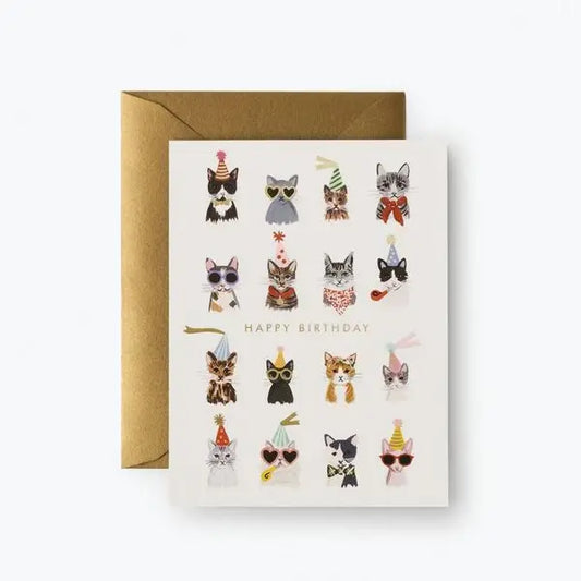 Greeting card with illustrations of cats wearing birthday hats and accessories on a white background.