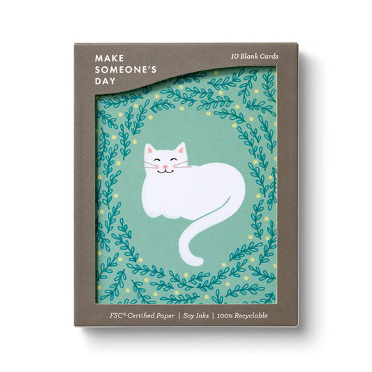 Pack of 10 blank cards with a cat illustration on a green background, featuring FSC-certified paper and soy ink.