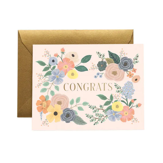 Greeting card with floral design and 'Congrats' text, accompanied by a gold envelope 